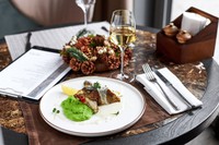 Trout with wine sauce and green pea puree